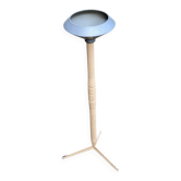Vintage ashtray on a beige and grey metal stand.