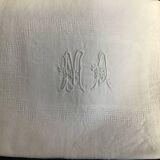 Damask napkins embroidered with an MA monogram