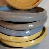 Seven vintage potter's sweet treat plates
