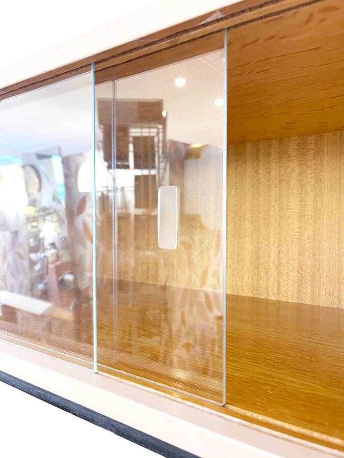 Pink glass wall bookcase, 1960