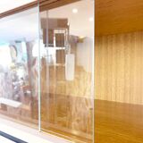 Pink glass wall bookcase, 1960
