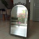 Old beveled wrought iron mirror late nineteenth century
