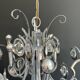 Chrome Metal Design with Swirls and Optical Glass Lenses. Tra