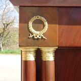 Flamed mahogany enfilade with sea green marble in Empire style.