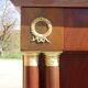 Flamed mahogany enfilade with sea green marble in Empire style.