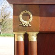 Flamed mahogany enfilade with sea green marble in Empire style.