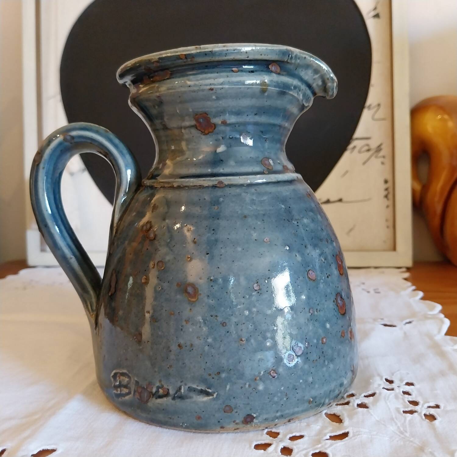 Glazed stoneware jug signed Baudat