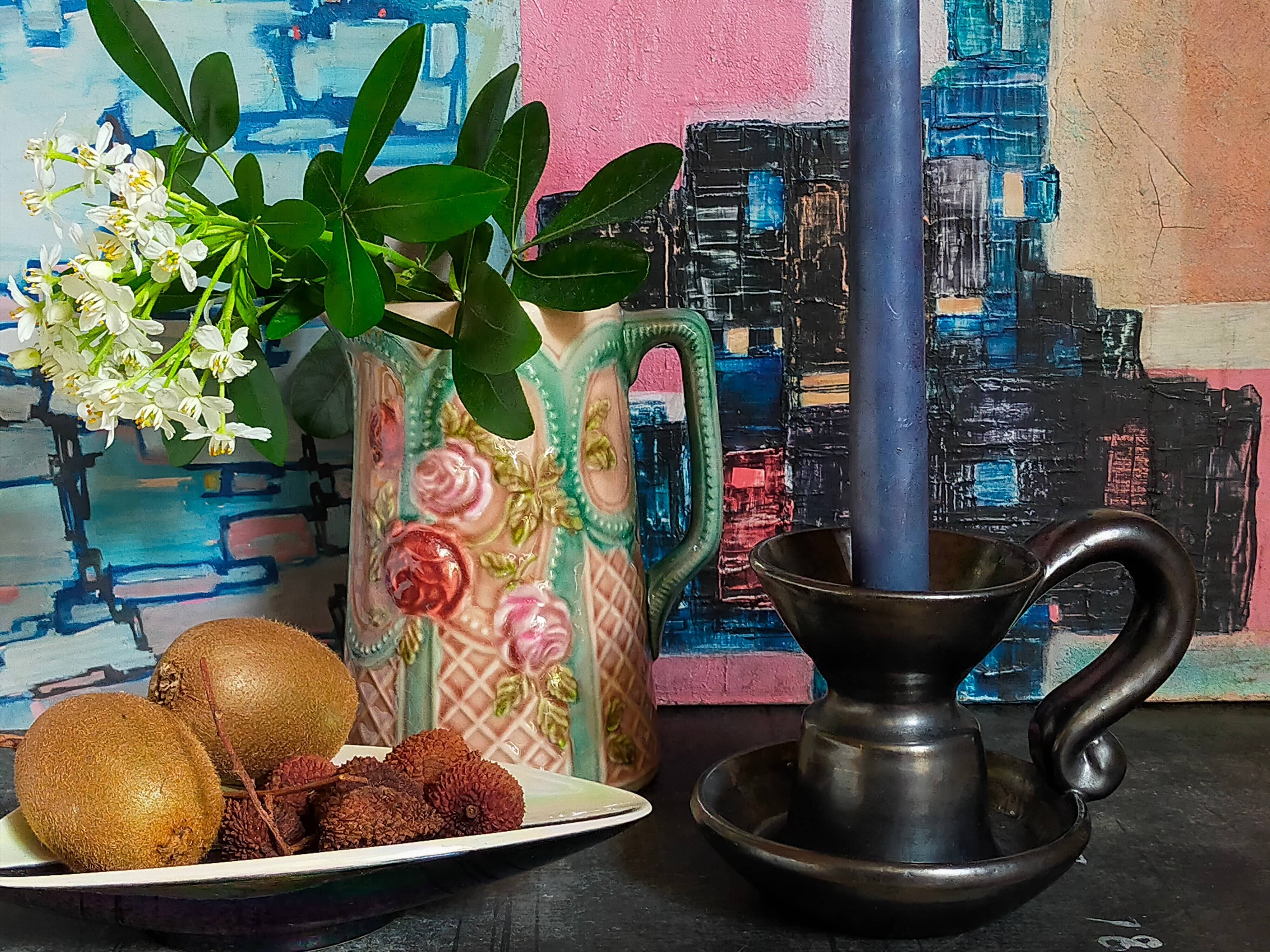 1950s iridescent black ceramic hand candle holder