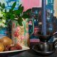 1950s iridescent black ceramic hand candle holder