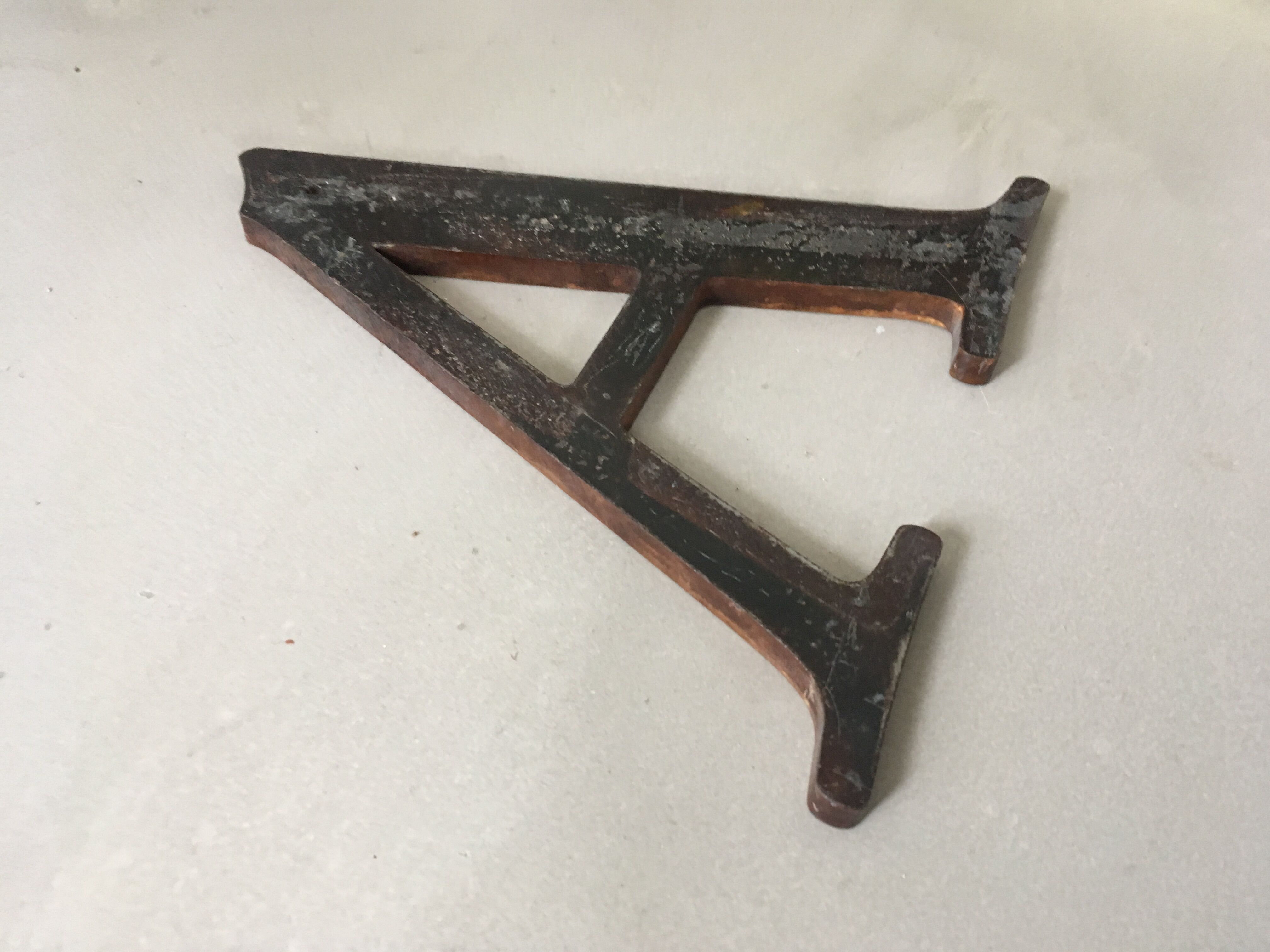 Solid metal sign letter "A"