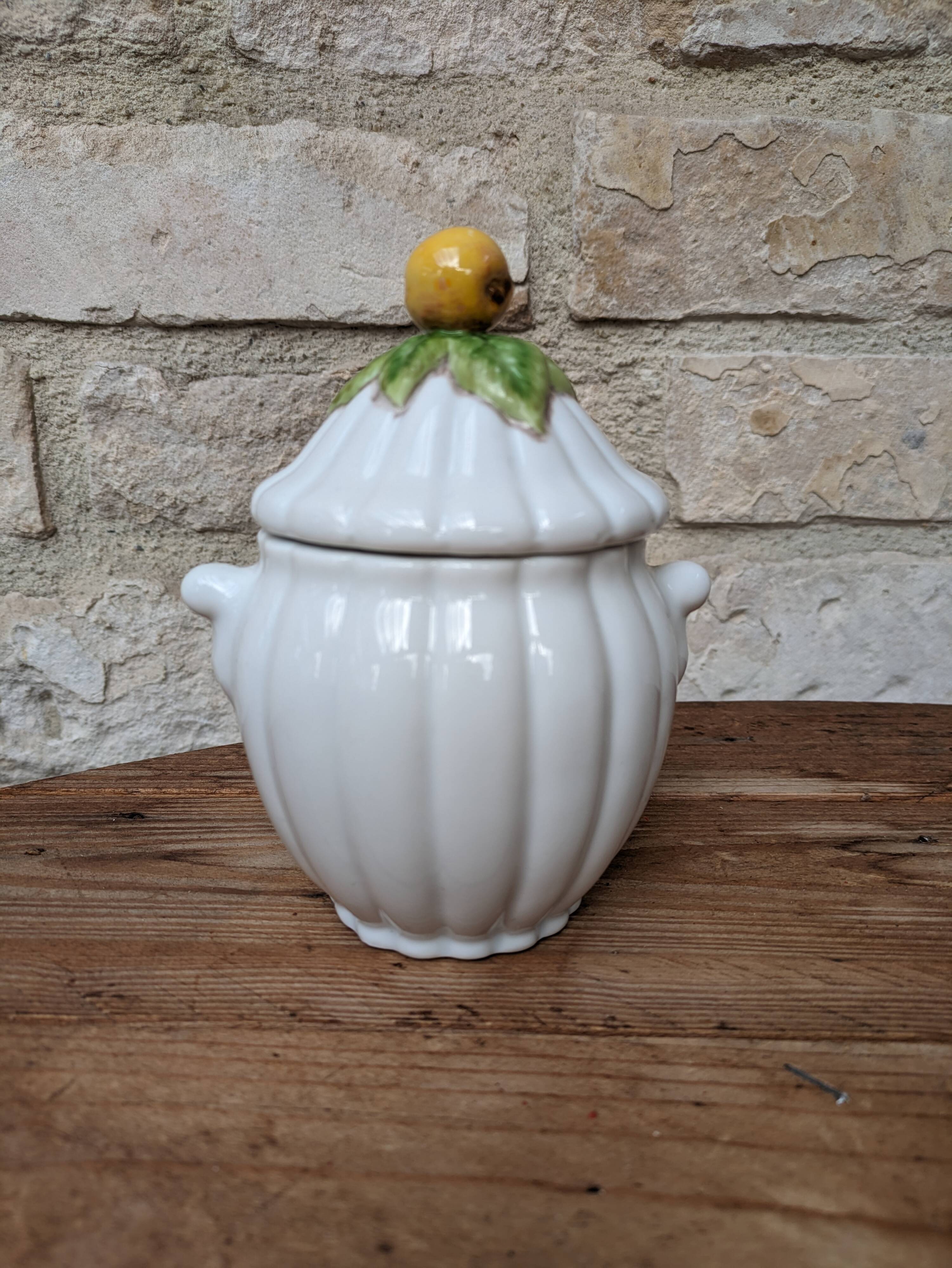 Old ceramic sugar bowl with yellow fruit motif