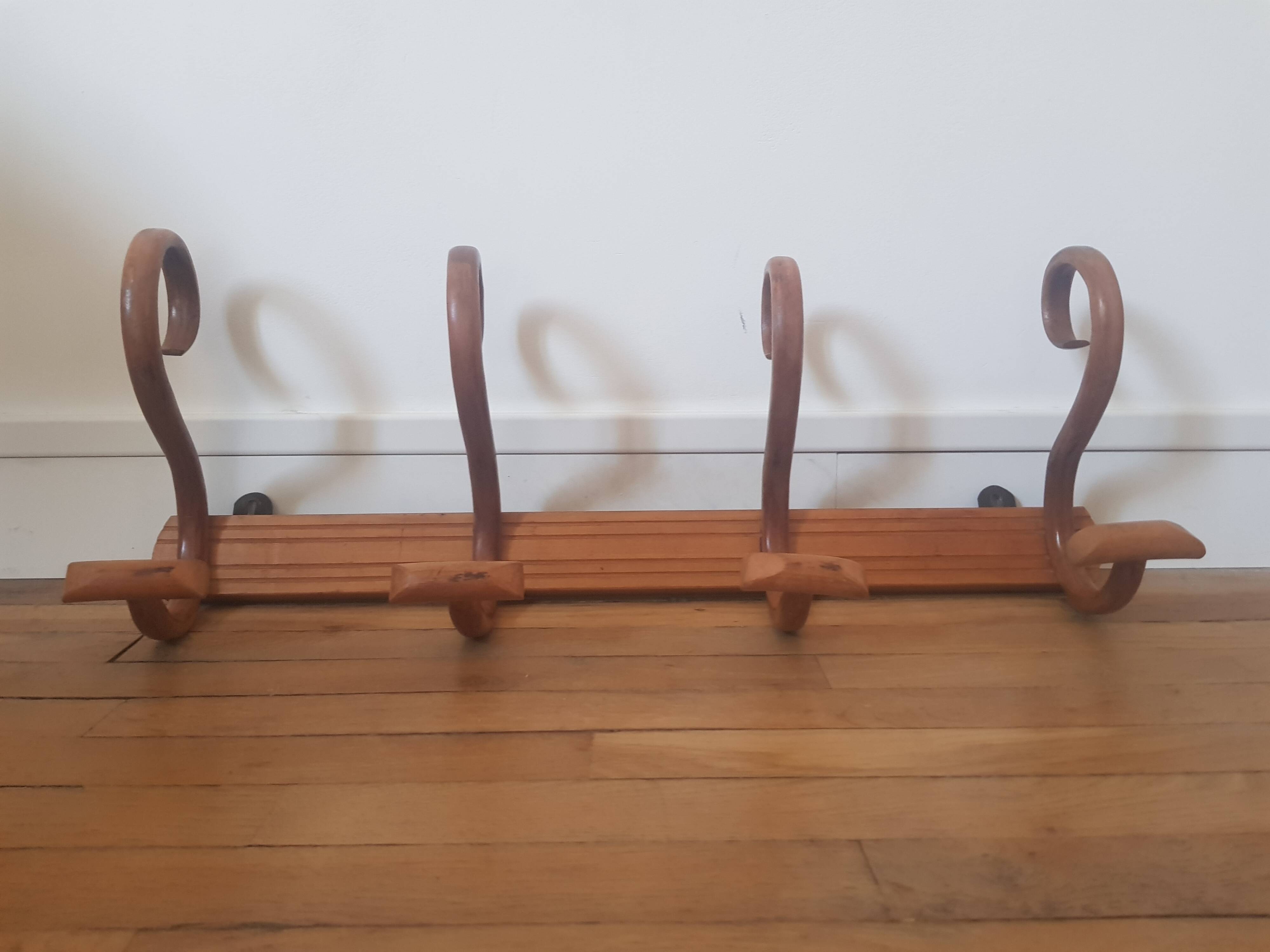 Wooden wall coat rack