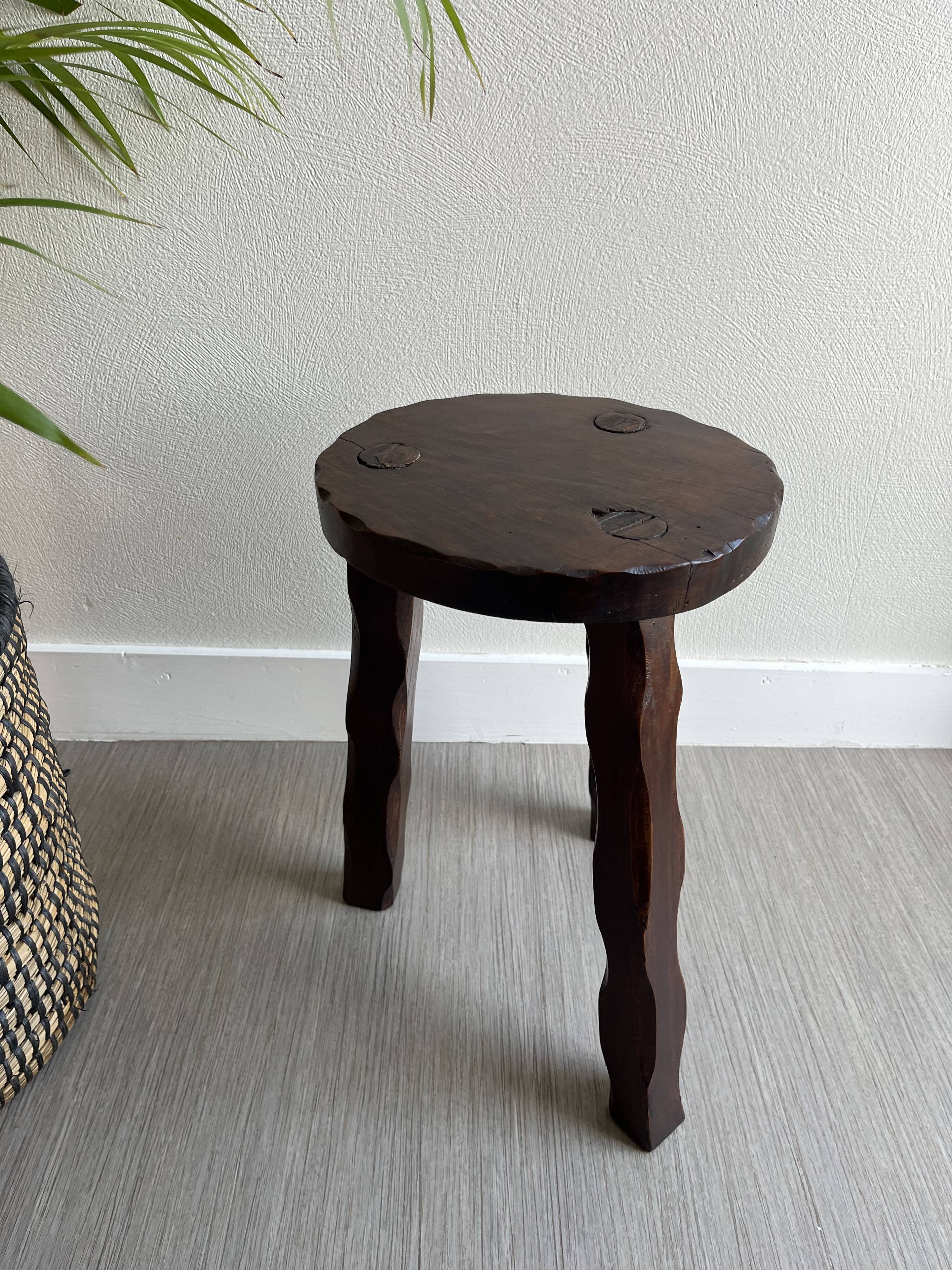 Wooden tripod stool