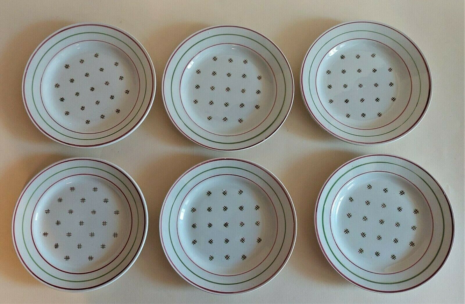 Series of six Lunéville KG earthenware dessert plates