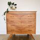 Commode en marqueterie de bois et pieds compas