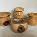 Four solid turned wooden vases