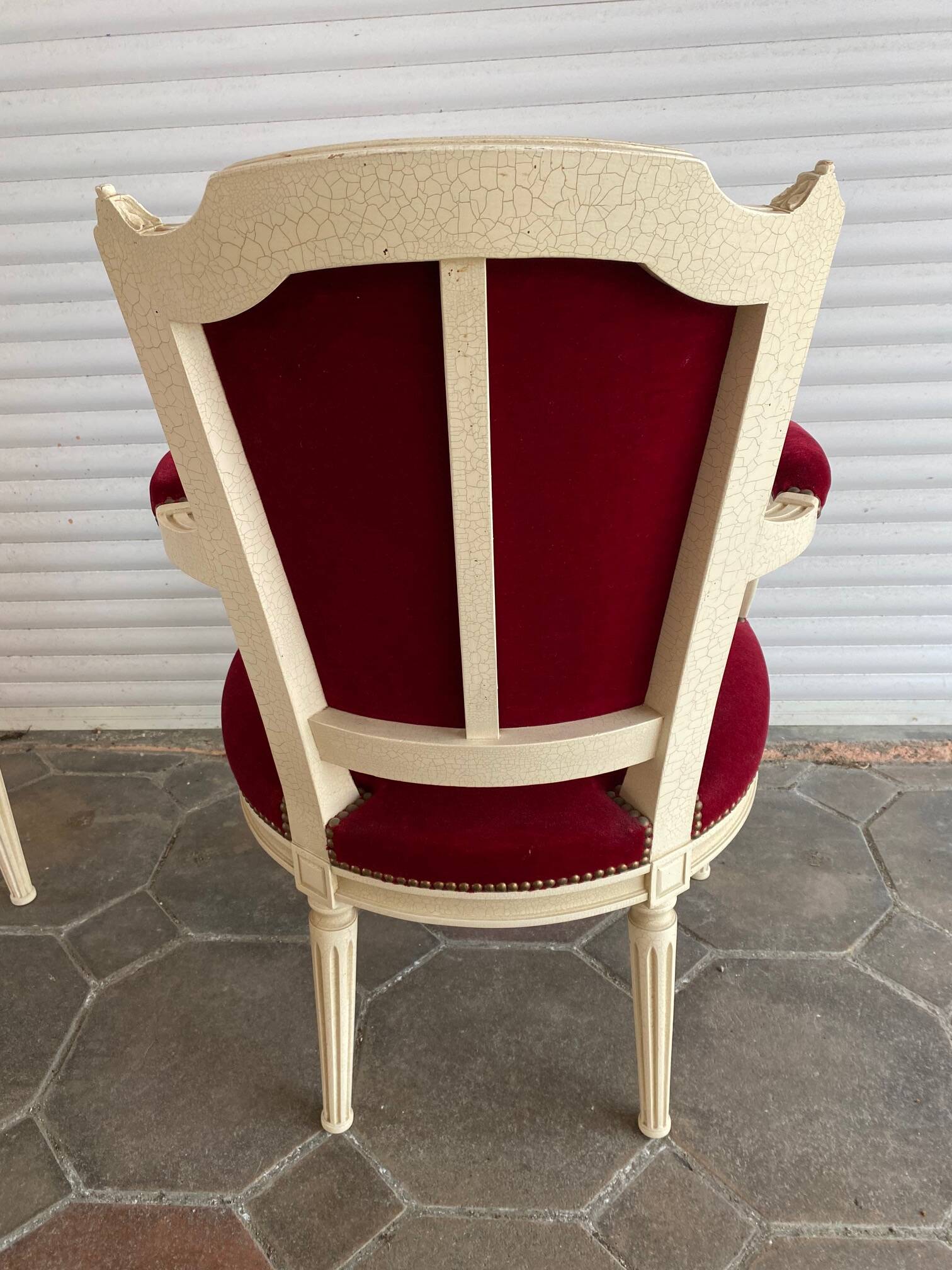 PAIR OF LOUIS XVI STYLE CABRIOLET ARMCHAIRS IN STUDDED RED VELVET FABRIC