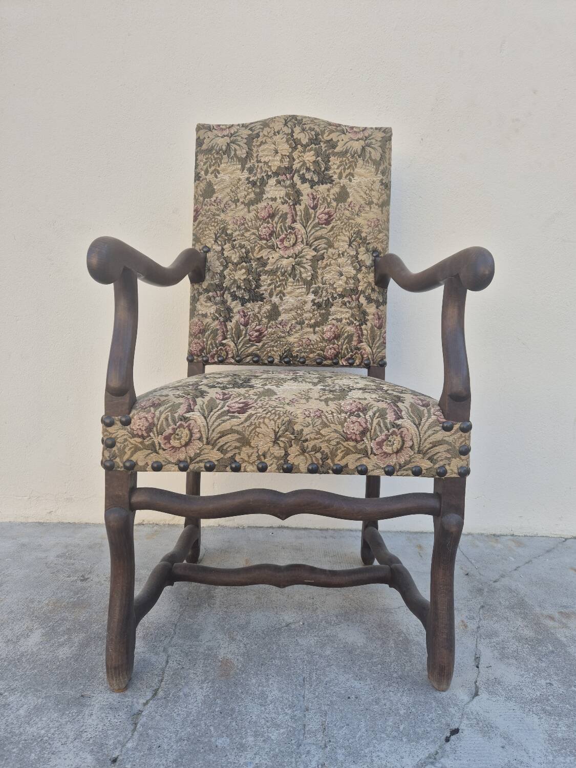 Louis XIII style armchair in walnut