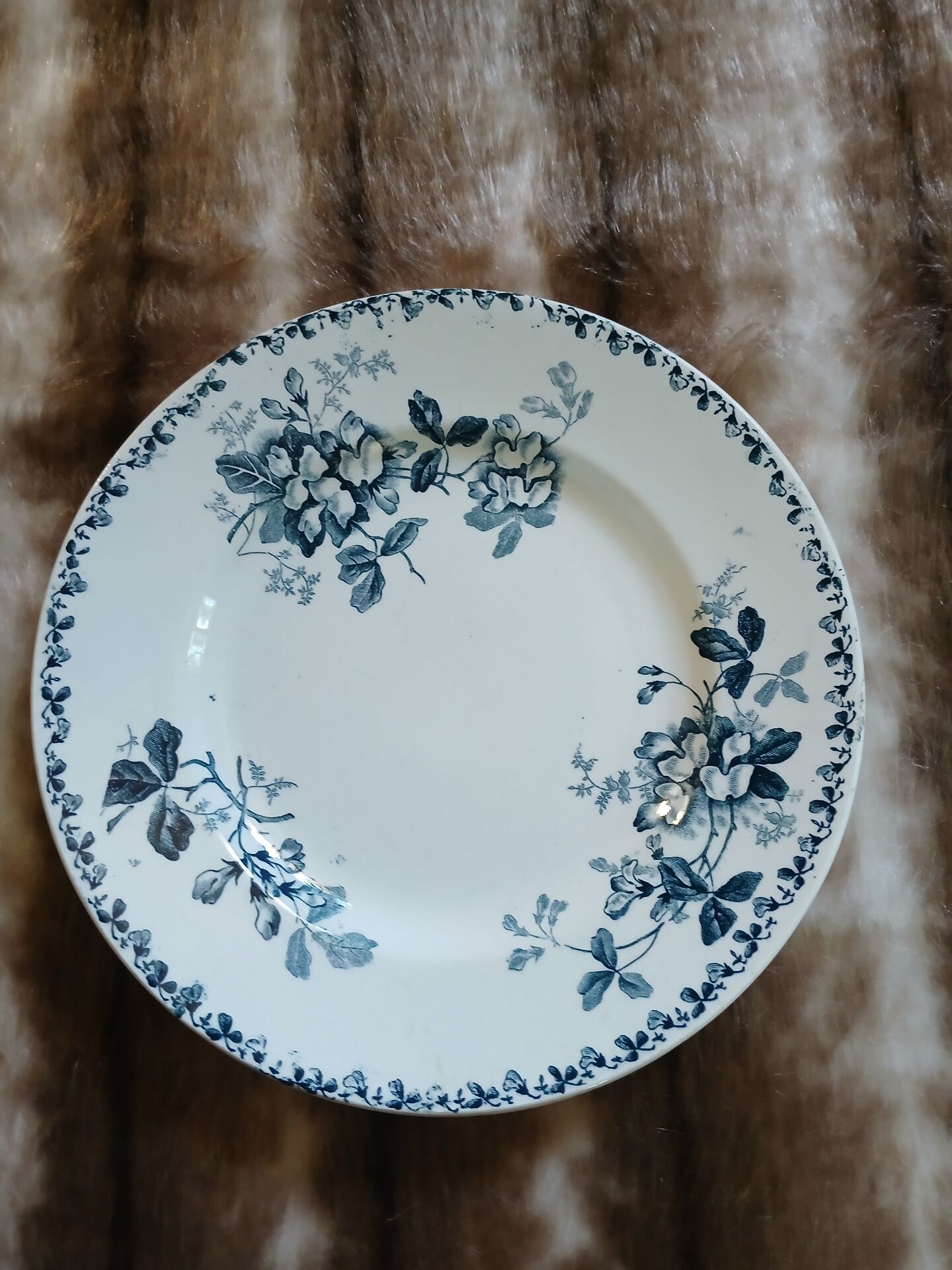 13 mismatched flat plates in ironstone
