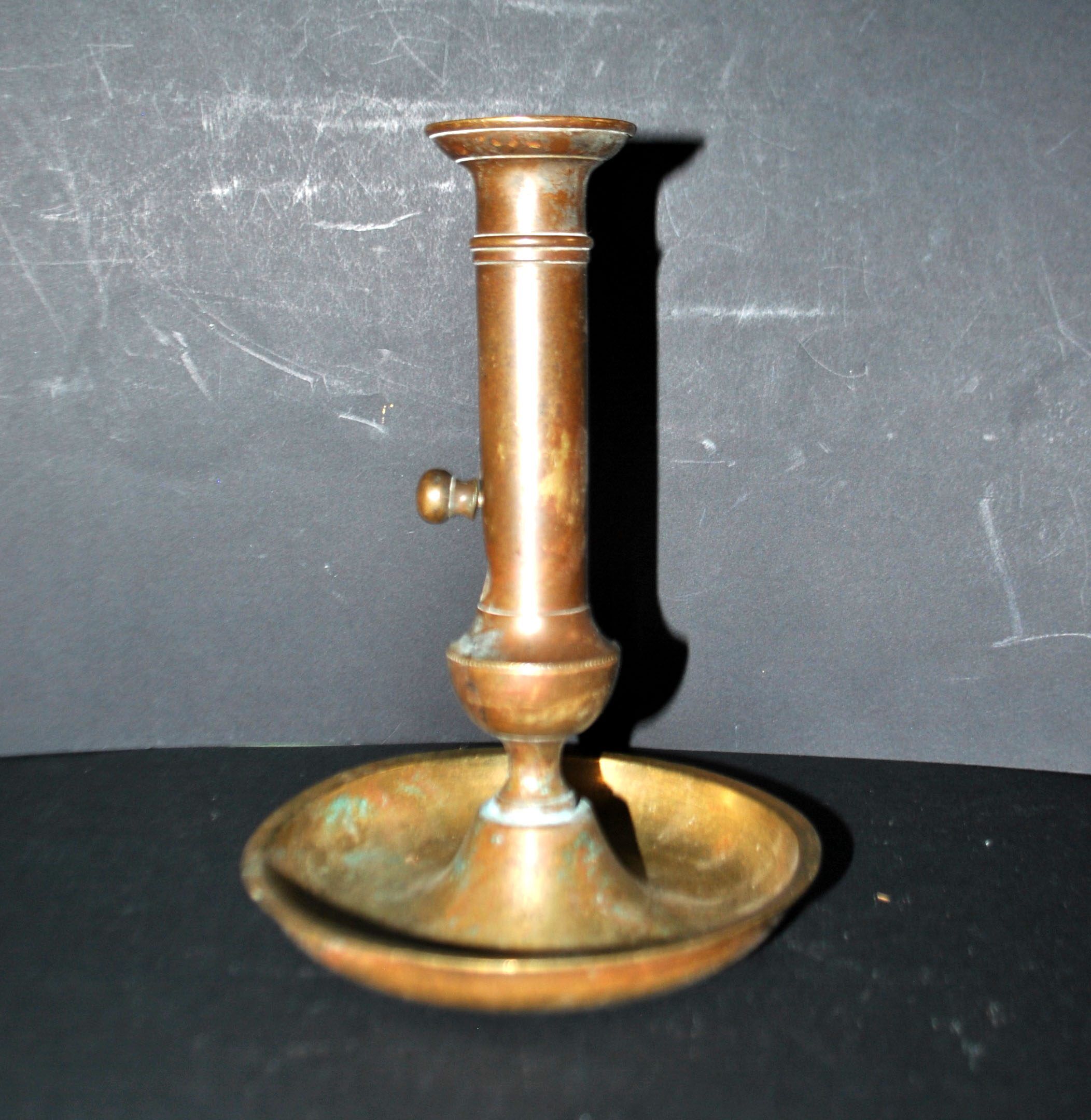 Antique push candle holder, 18th century gilded carved bronze candlestick.