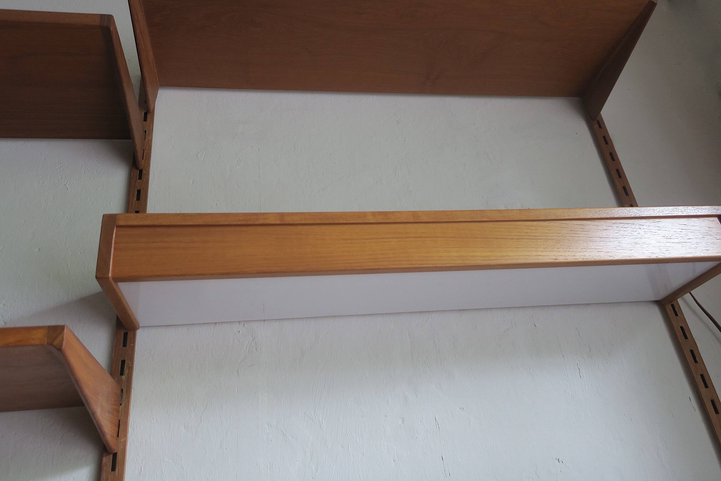 Modular 3-compartment teak wall shelving system with desk and lighting by Kai Kristiansen for FM, Denmark, 1960s