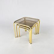 Tables gigognes en laiton et verre fumé, années 1970