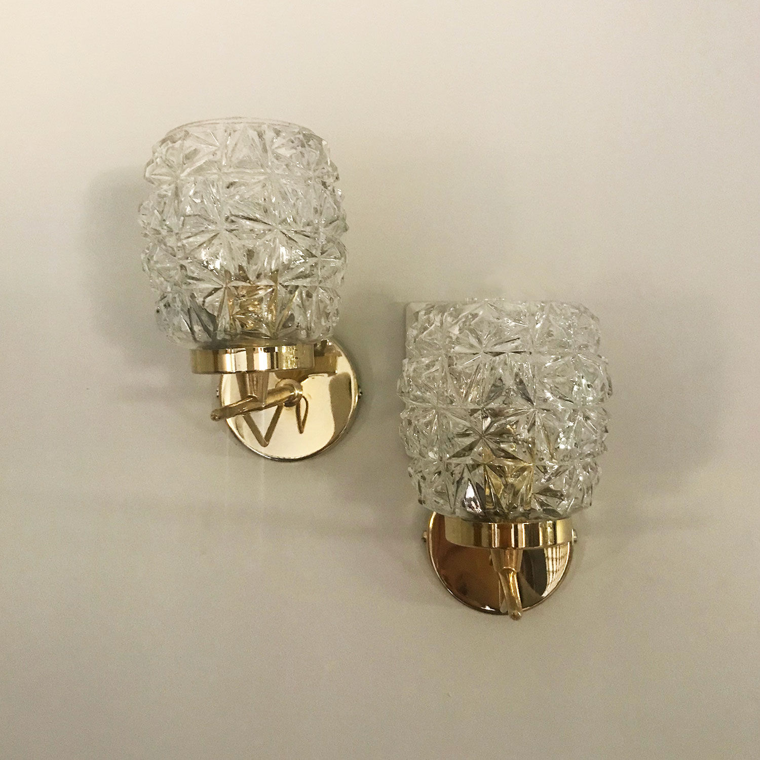 Pair of glass and brass wall lamps