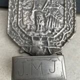 Small wall-mounted holy water font