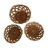 Set of three old rattan baskets