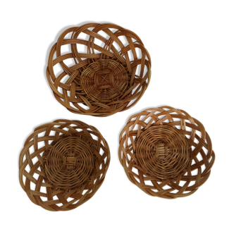 Set of three old rattan baskets