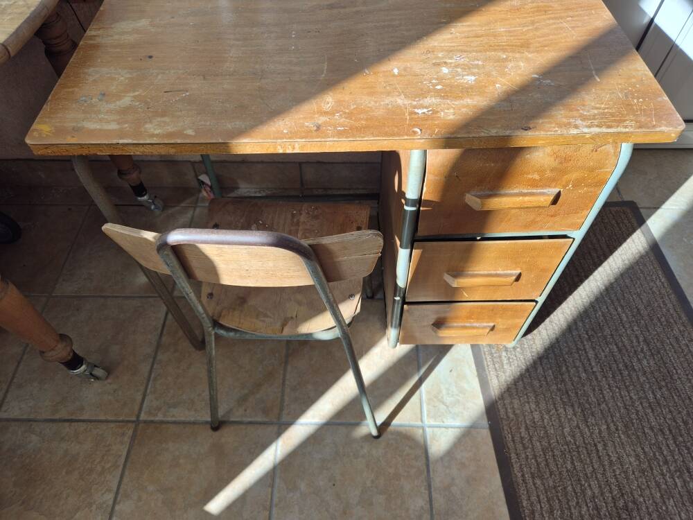 Child's desk with chair in its original condition.