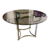 Dining table in chrome metal and smoked glass.