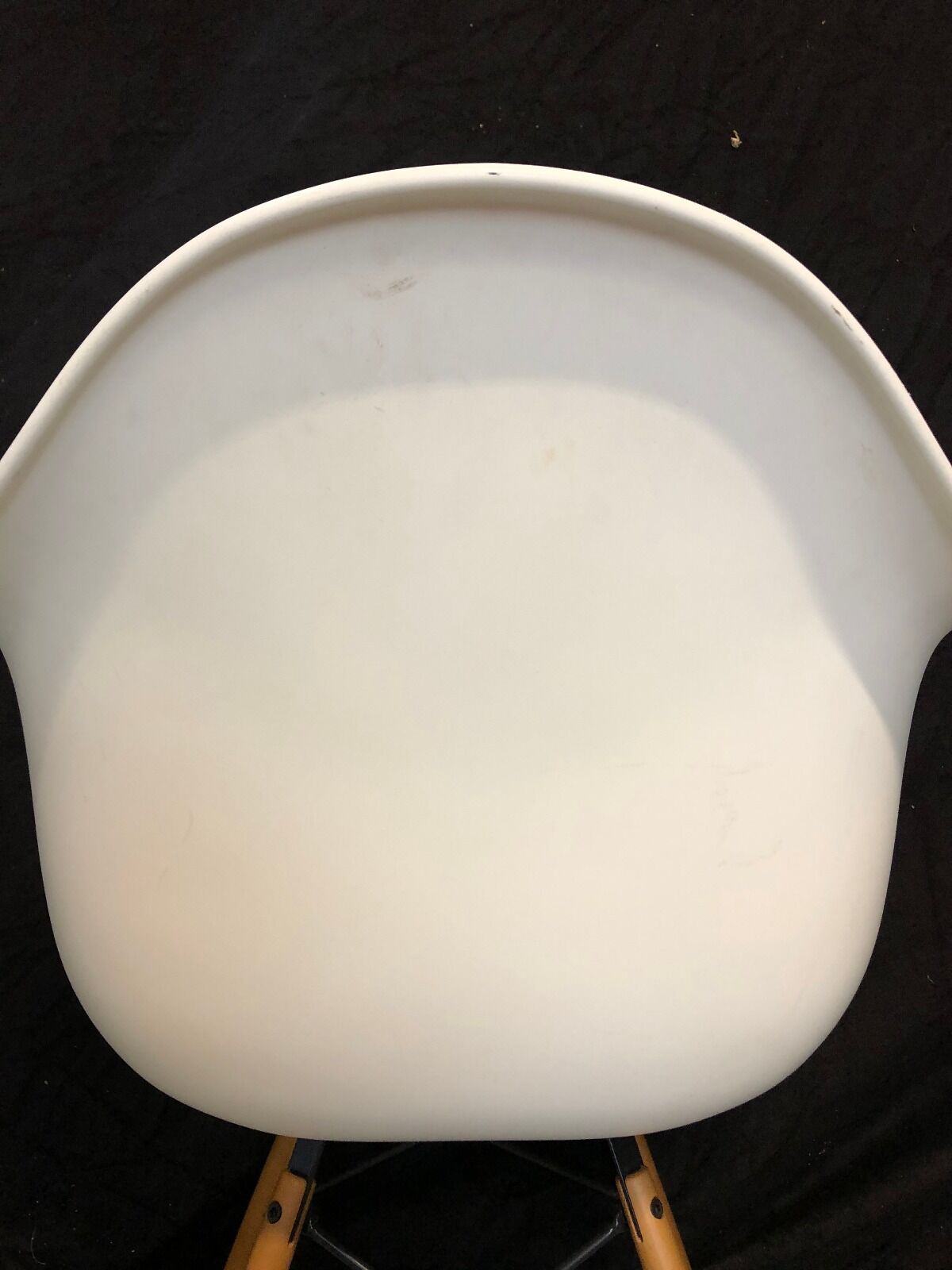 White DAW armchair by Charles & Ray Eames