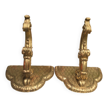 Important, pair of wooden consoles with gilded stucco in Louis XV style. XIX century.
