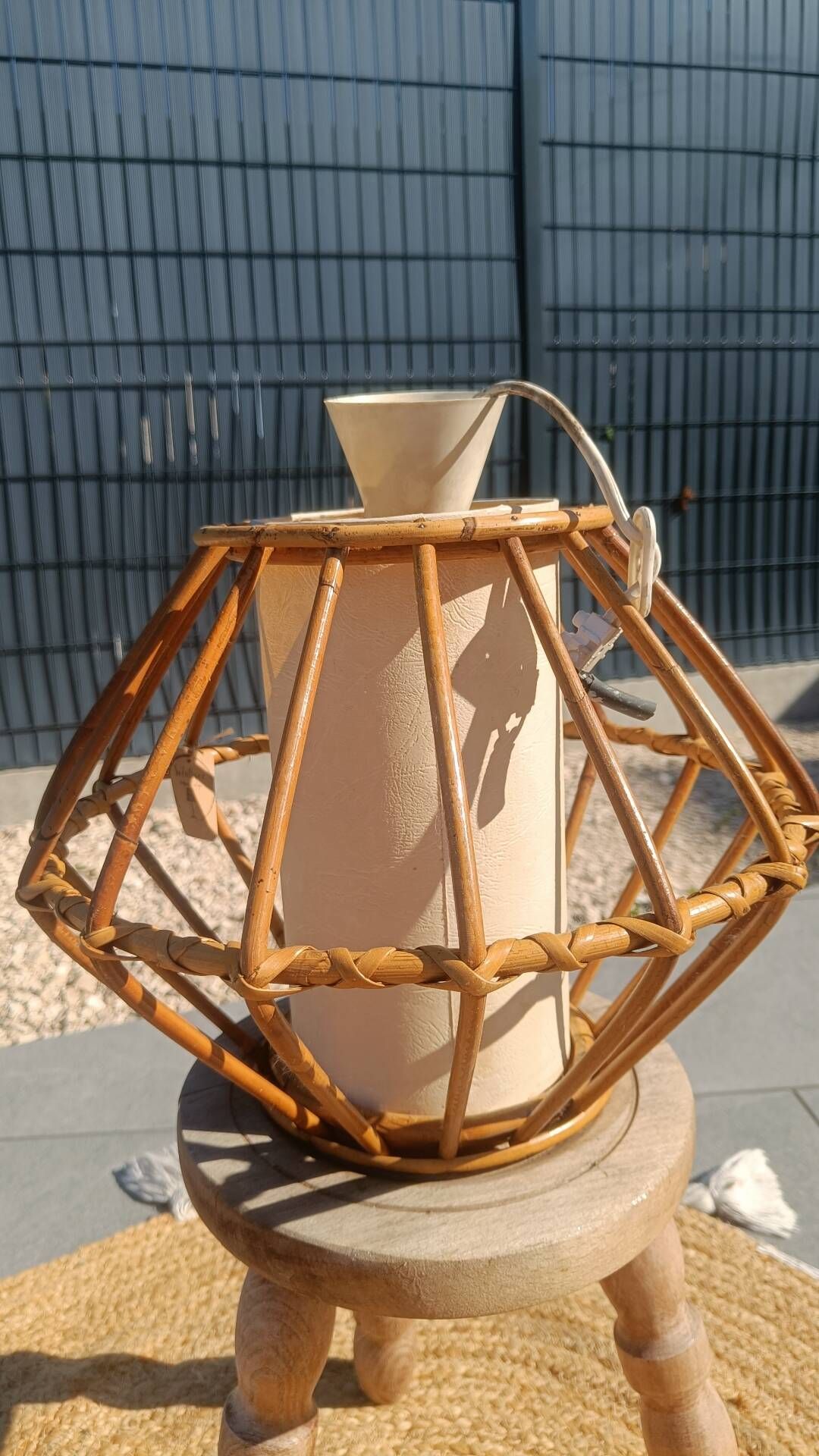 Vintage rattan and bamboo pendant light with removable shade.