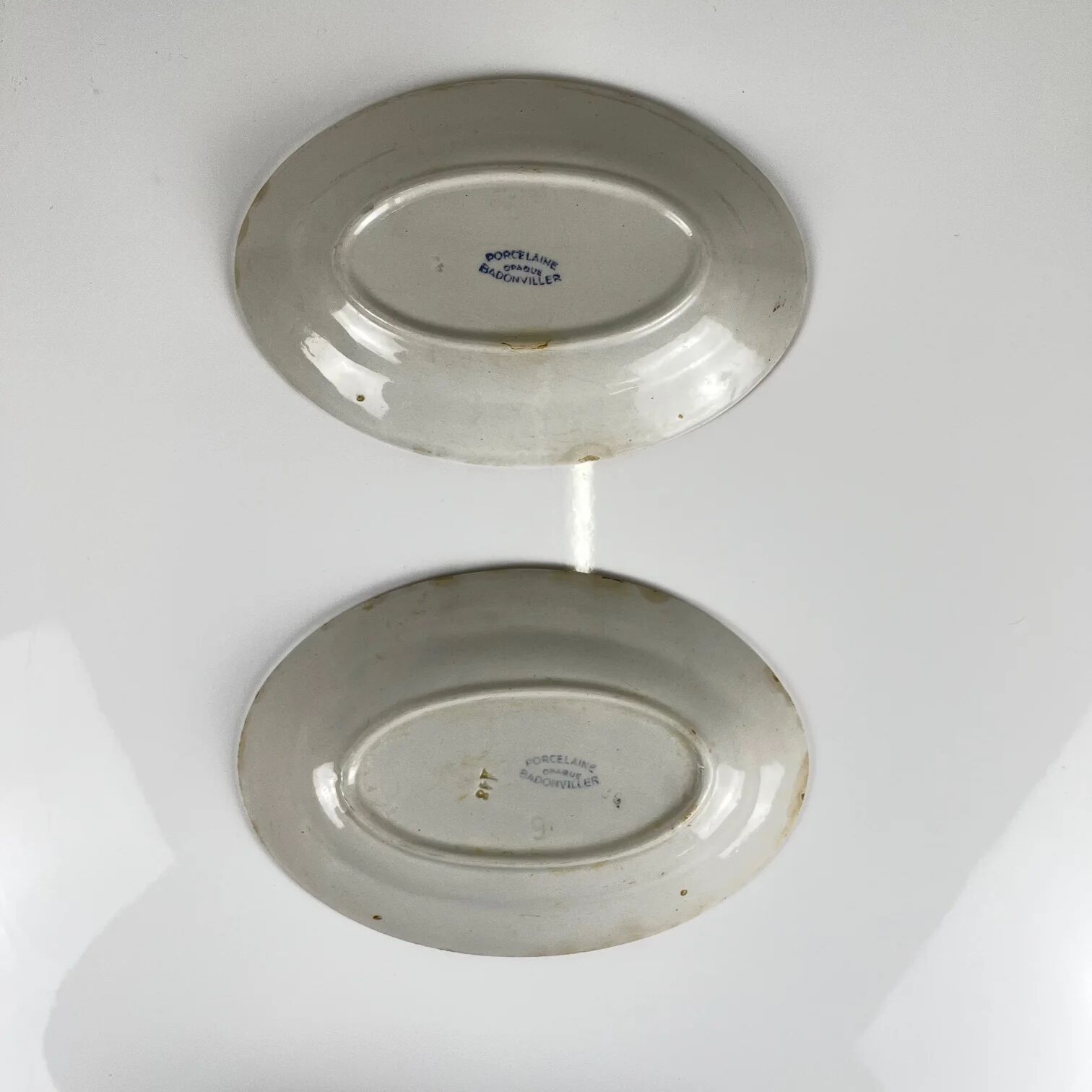 Pair of porcelain serving dishes, Badonviller, red flower, 1950