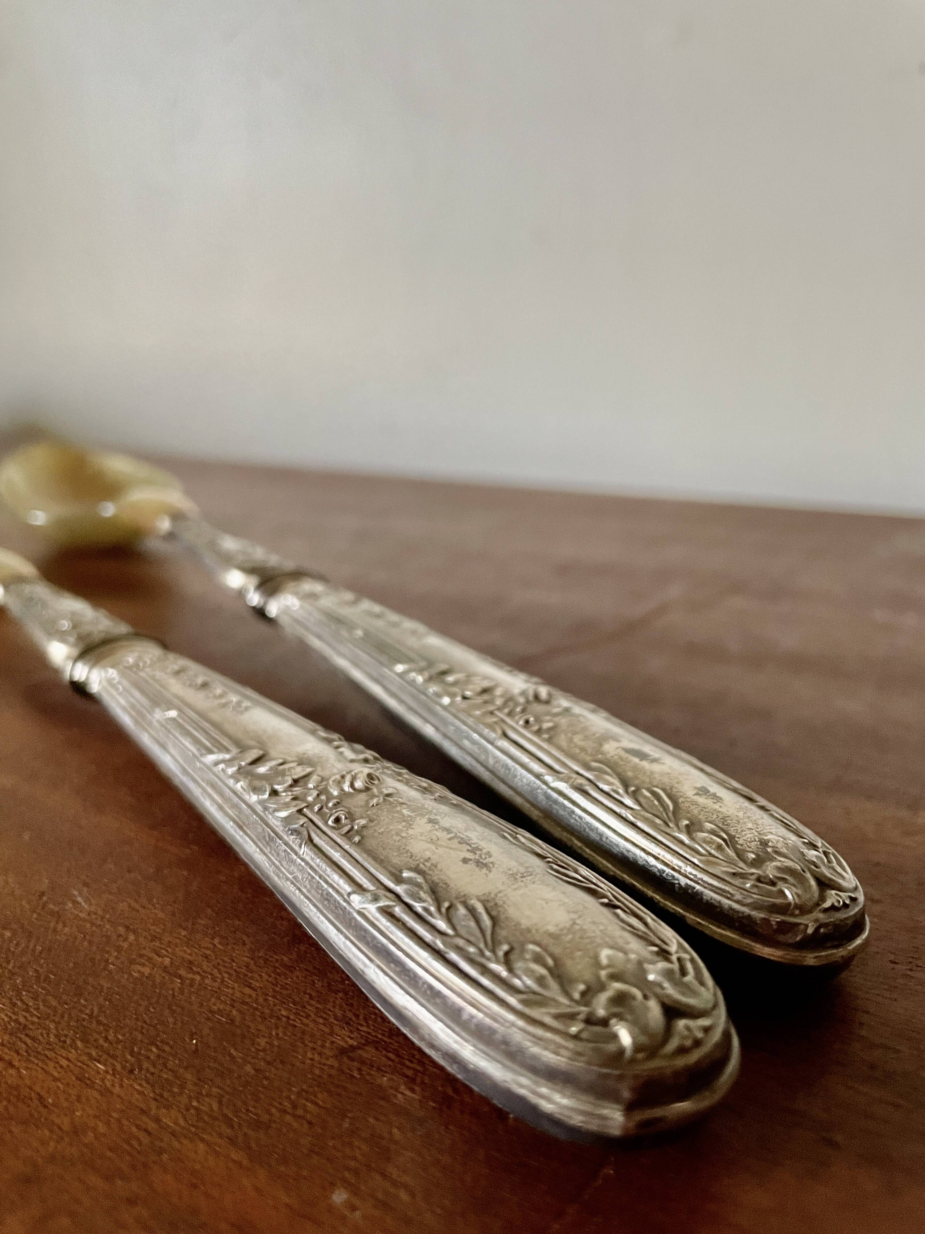 Horn and silver-plated salad cutlery, early 20th century.