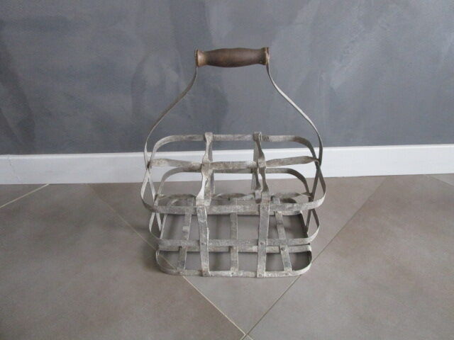 Antique metal bottle holder