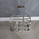 Antique metal bottle holder