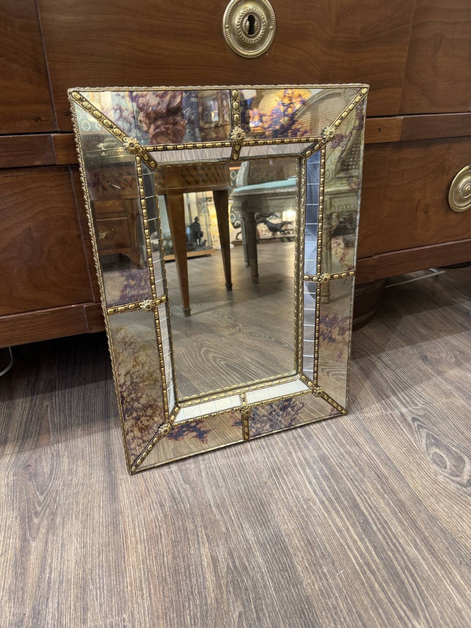 Vintage Venetian mirror with a frame from around 1970.