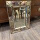 Vintage Venetian mirror with a frame from around 1970.