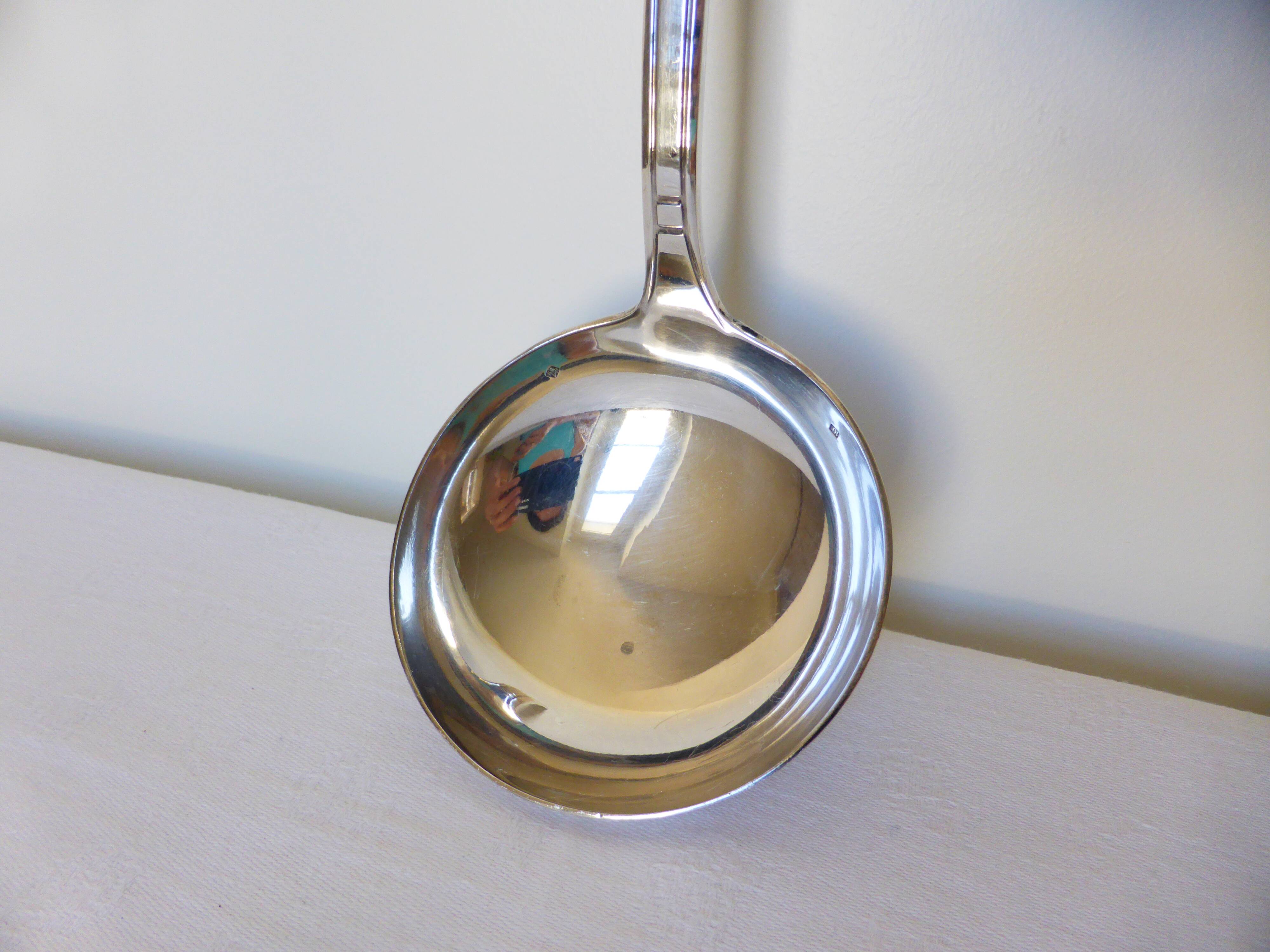 Shabby vintage silver-plated ladle.