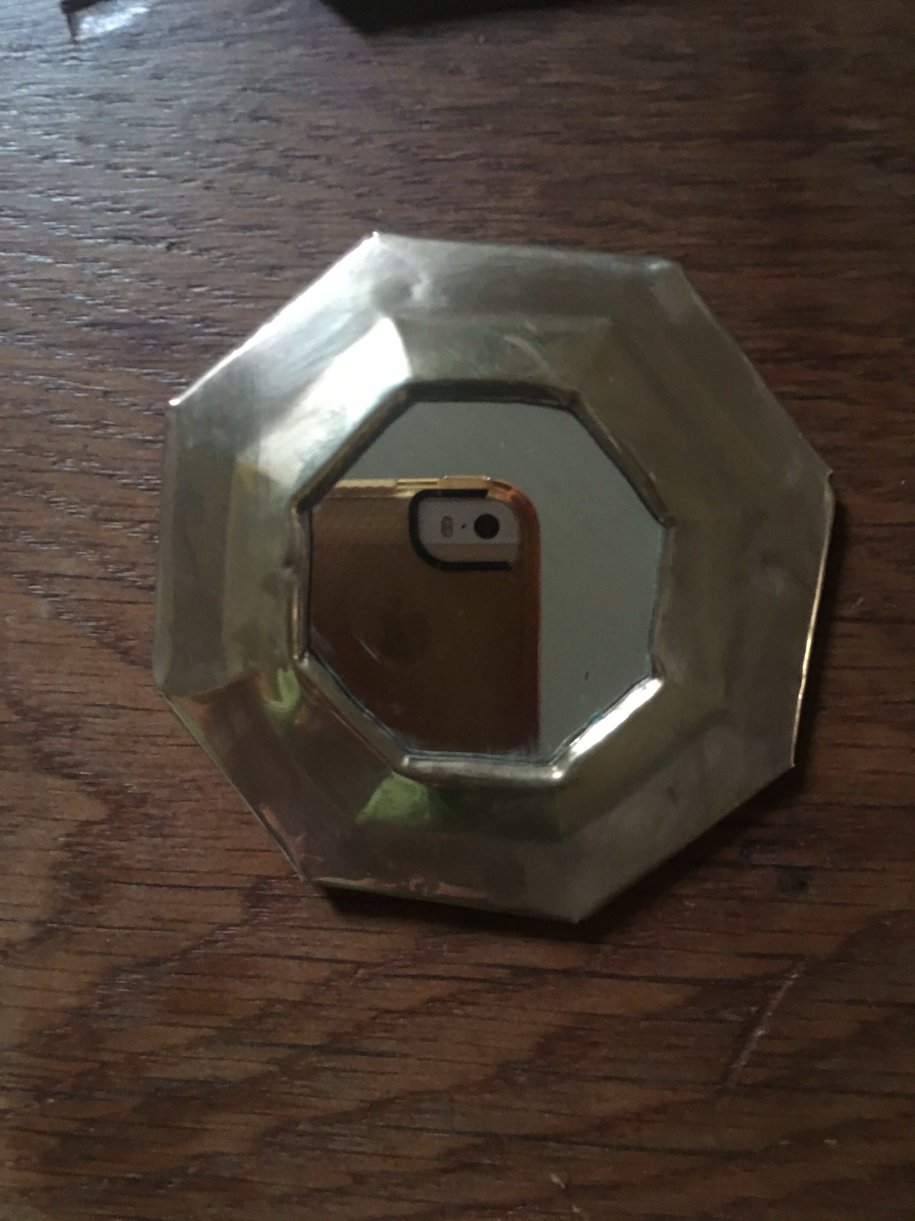 Ethnic brass mirrors.