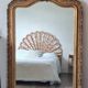 Antique Louis Philippe mirror with a pediment.