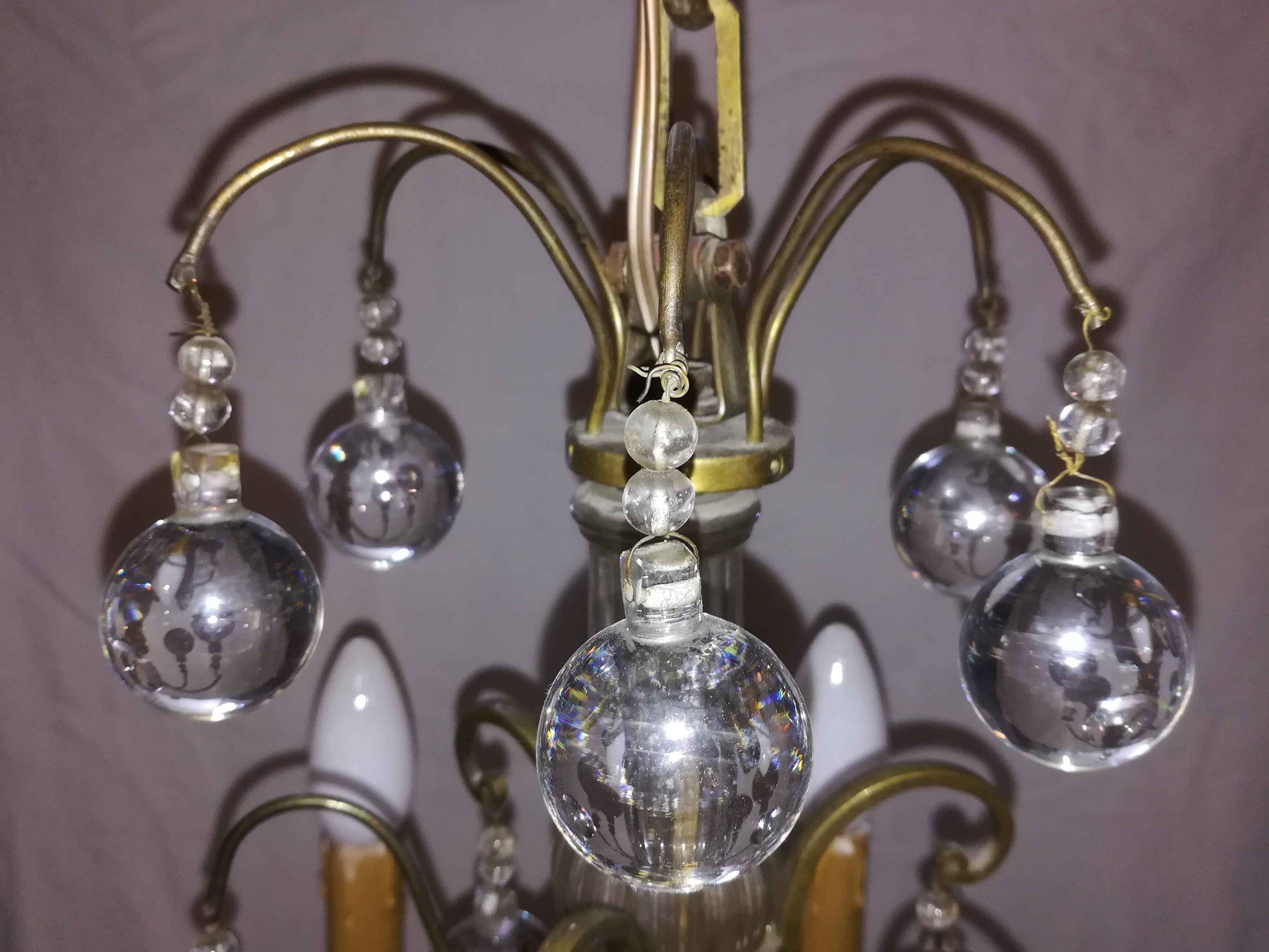 Bronze chandelier and stamps balls