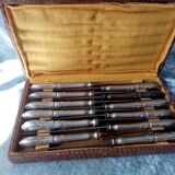 Box of 12 steel table knives and silver handle