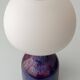 Mid-century modern table lamp by Jaap Ravelli, ceramic base and glass shade.