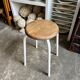 White tubular metal and wood stool