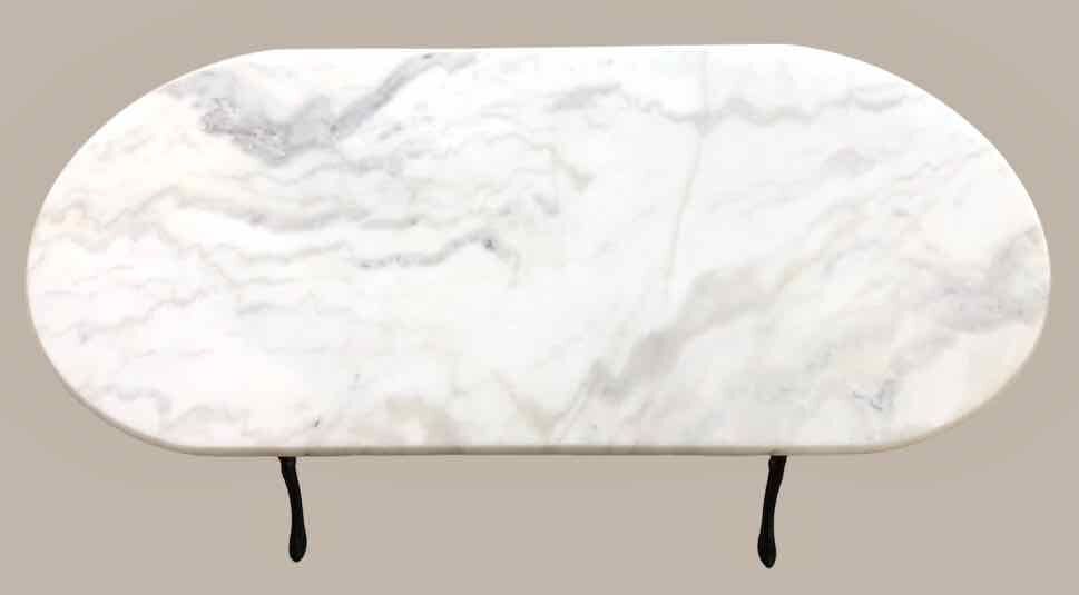 Oval marble and cast iron bistro table