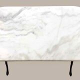 Oval marble and cast iron bistro table